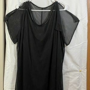 Black sheer over black cami.